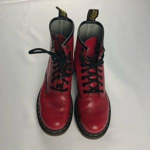 Red Dr. Martens boots.